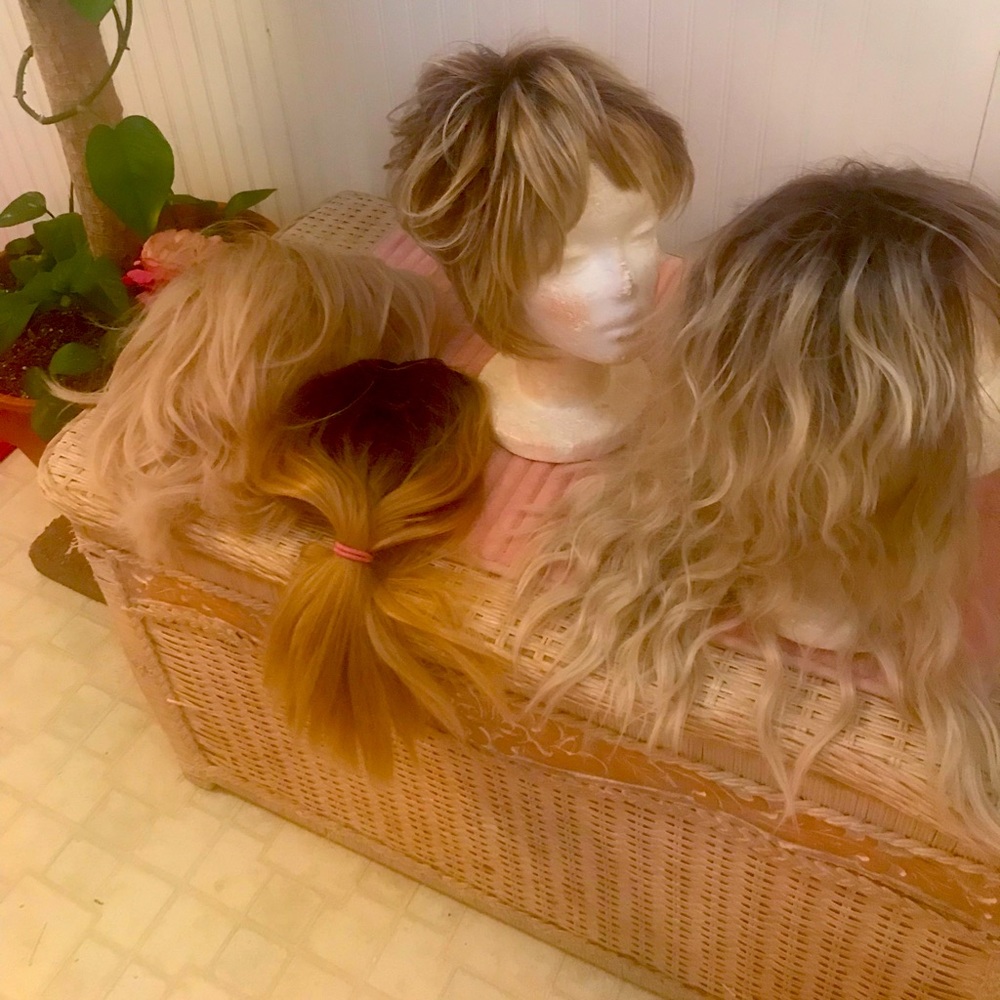 4 pieces. 2 wig toppers 2 wigs. Rene of Paris and Toni Brattin blonde mix.